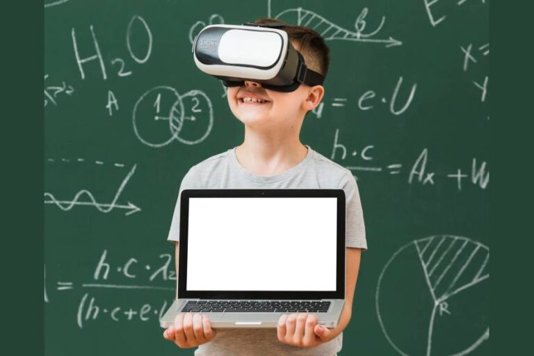 front view boy holding laptop while wearing virtual reality headset 1 | Techlog.gr - Χρήσιμα νέα τεχνολογίας
